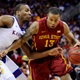 Bryce Dejean-Jones, No. 13, of the Iowa State Cyclones drives against Wayne Selden Jr. of the Kansas Jayhawks during the championship game of the Big 12 Basketball Tournament at Sprint Center on March 14, 2015, in Kansas City, Mo.
Ed Zurga/Getty Images